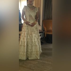 Ivory gold designer lehenga choli khajana boutique. 3pcs very heavy.